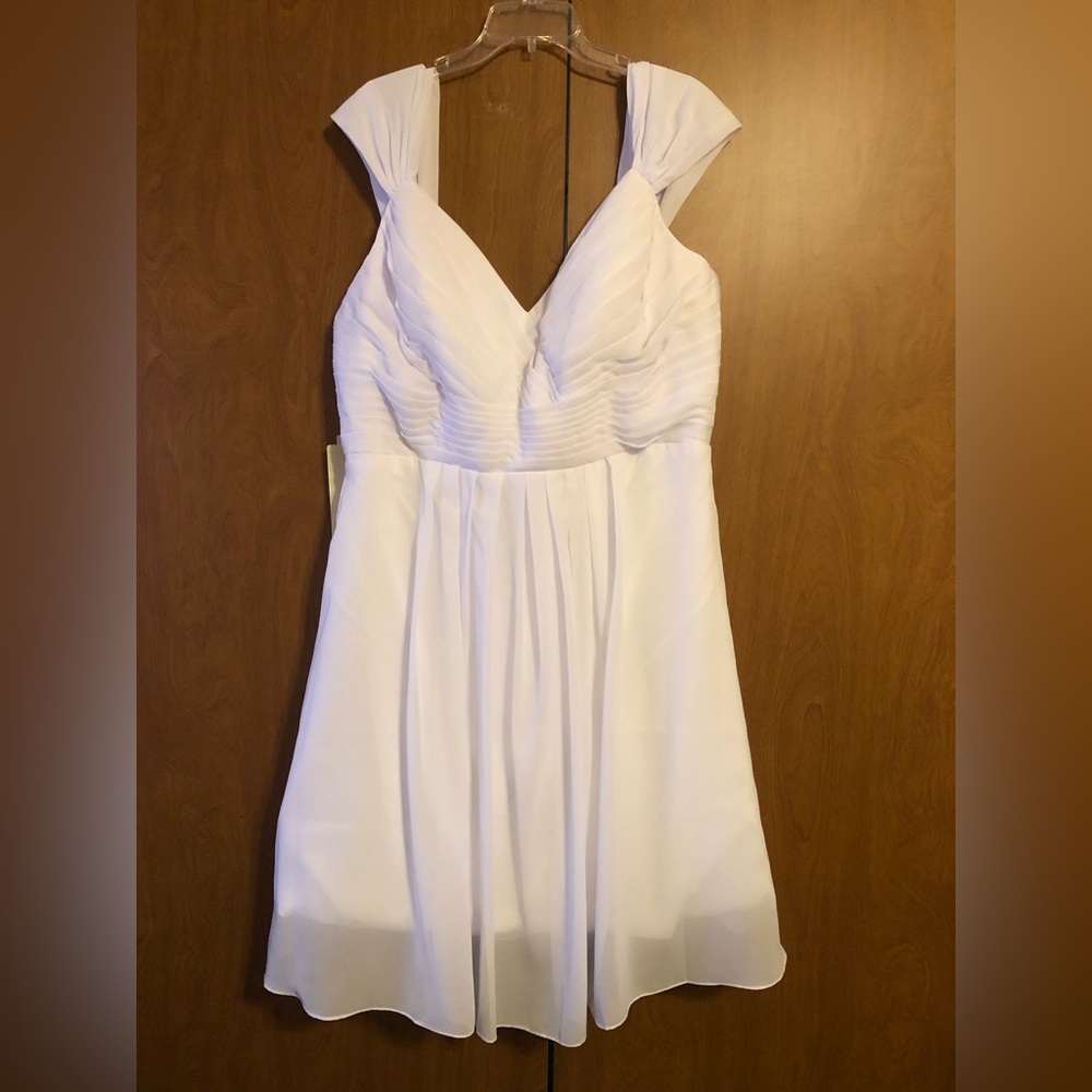 NWT White Wedding dress. Short ,flowy, lace up back, lined with built in bra. - Picture 2 of 5